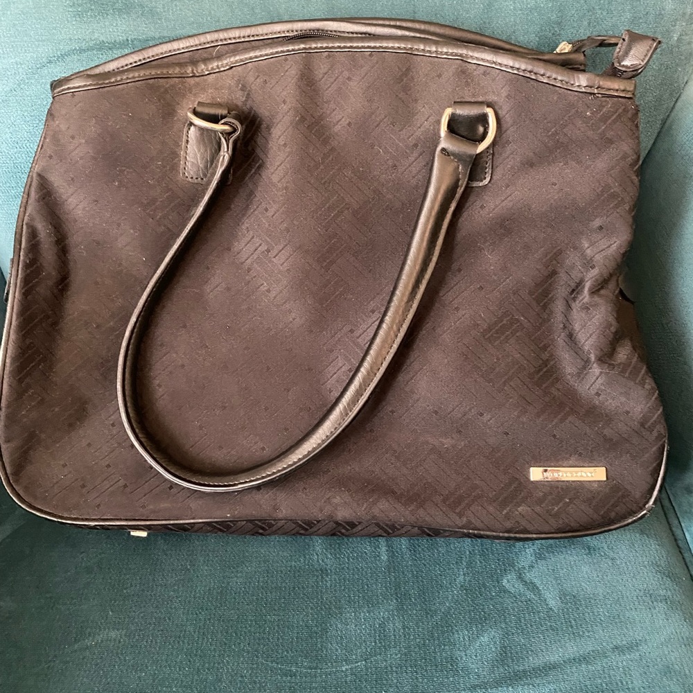 Black travel bag with loads of storage